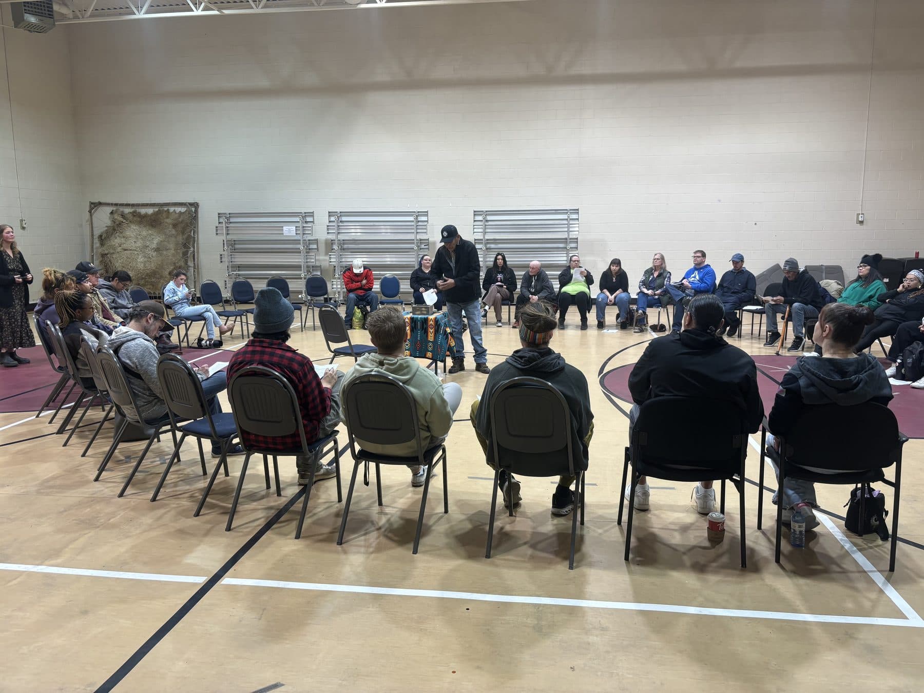 Community members seated in a circle during a Birchbark session